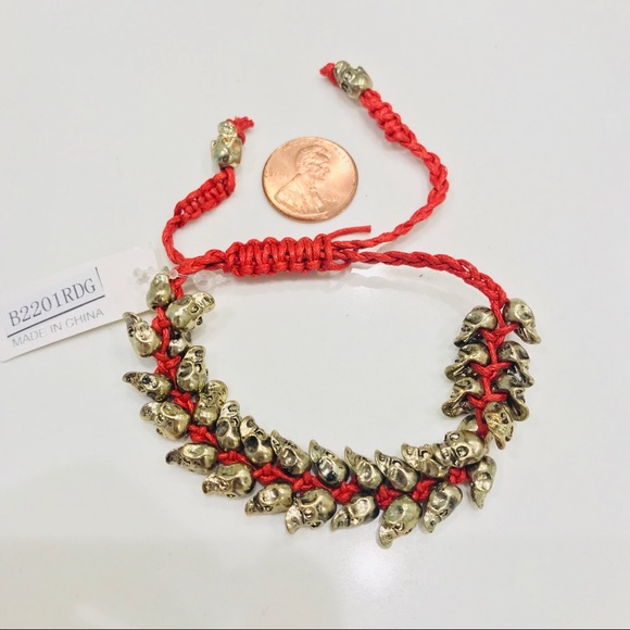 NWT bracelet, multiple bronze skulls & red thread - Picture 8 of 8